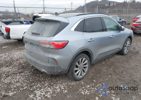 2022 Ford Escape Titanium z USA, uszkodzony, nr VIN 1FMCU9J94NUA14417